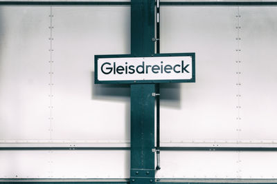 Close-up of information sign at subway station