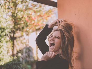 Portrait of woman screaming