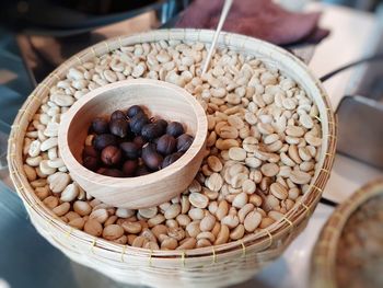 High angle view of coffee beans in bowl on table