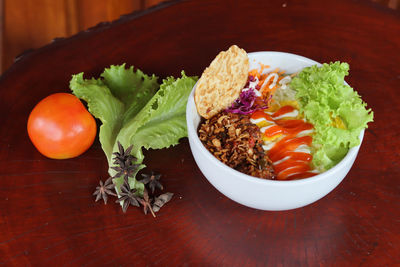 High angle view of salad served in bowl on table