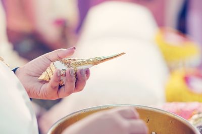 Close-up of woman holding ice cream