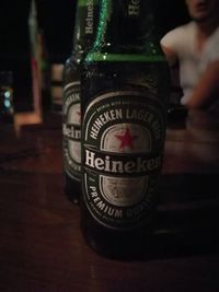 Close-up of beer bottle on table