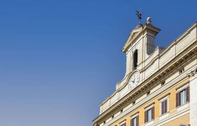 Low angle view of building against clear sky