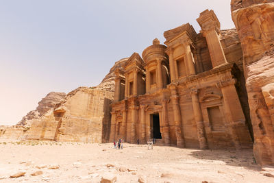 Low angle view of old ruins against clear sky