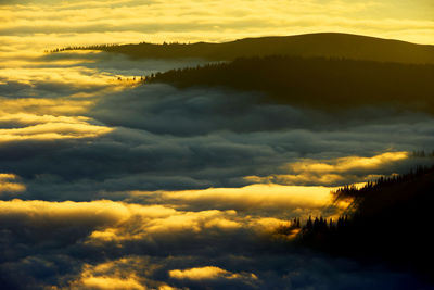 Scenic view of dramatic sky during sunset