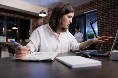 Businesswoman working at office