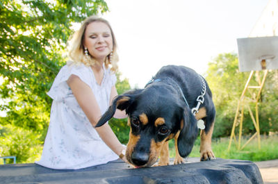 Portrait of woman with dog