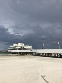 Pier over sea against sky