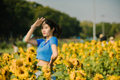 Full length of woman standing on field