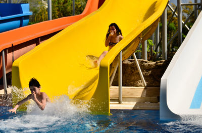 Woman playing in swimming pool