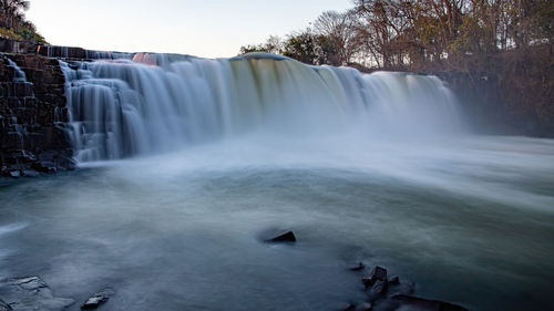 View of waterfall against sky