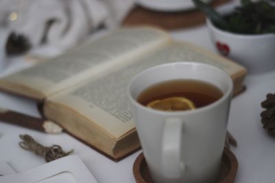 Close-up of coffee cup on table