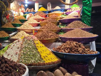 Various food for sale at market stall during night