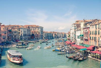 View of boats moored in city