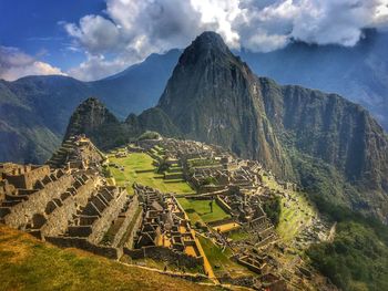 Panoramic view of a mountain against cloudy sky