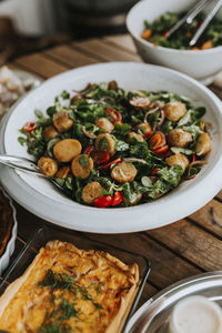 Salad in bowl on table