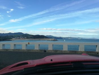 Scenic view of sea against blue sky