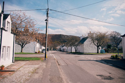 Empty road against sky