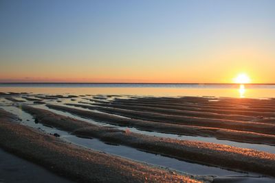 View of calm sea at sunset