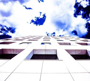 Low angle view of building against blue sky