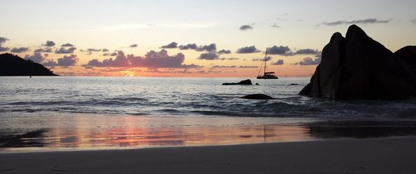 Scenic view of sea against sky during sunset