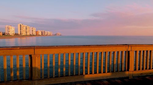 Scenic view of beach against sky during sunset