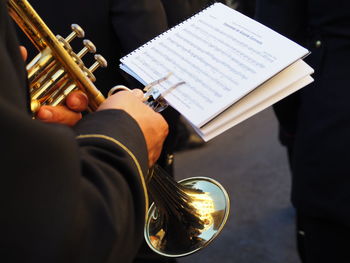 High angle view of man playing piano