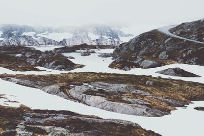 Scenic view of snow covered mountains