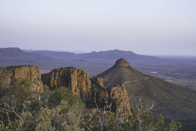 Scenic view of rocky mountains against sky at valley of desolation during sunset