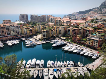 High angle view of buildings and harbour in city