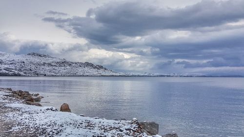 Scenic view of sea against sky during winter