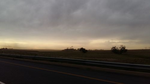 Road passing through field