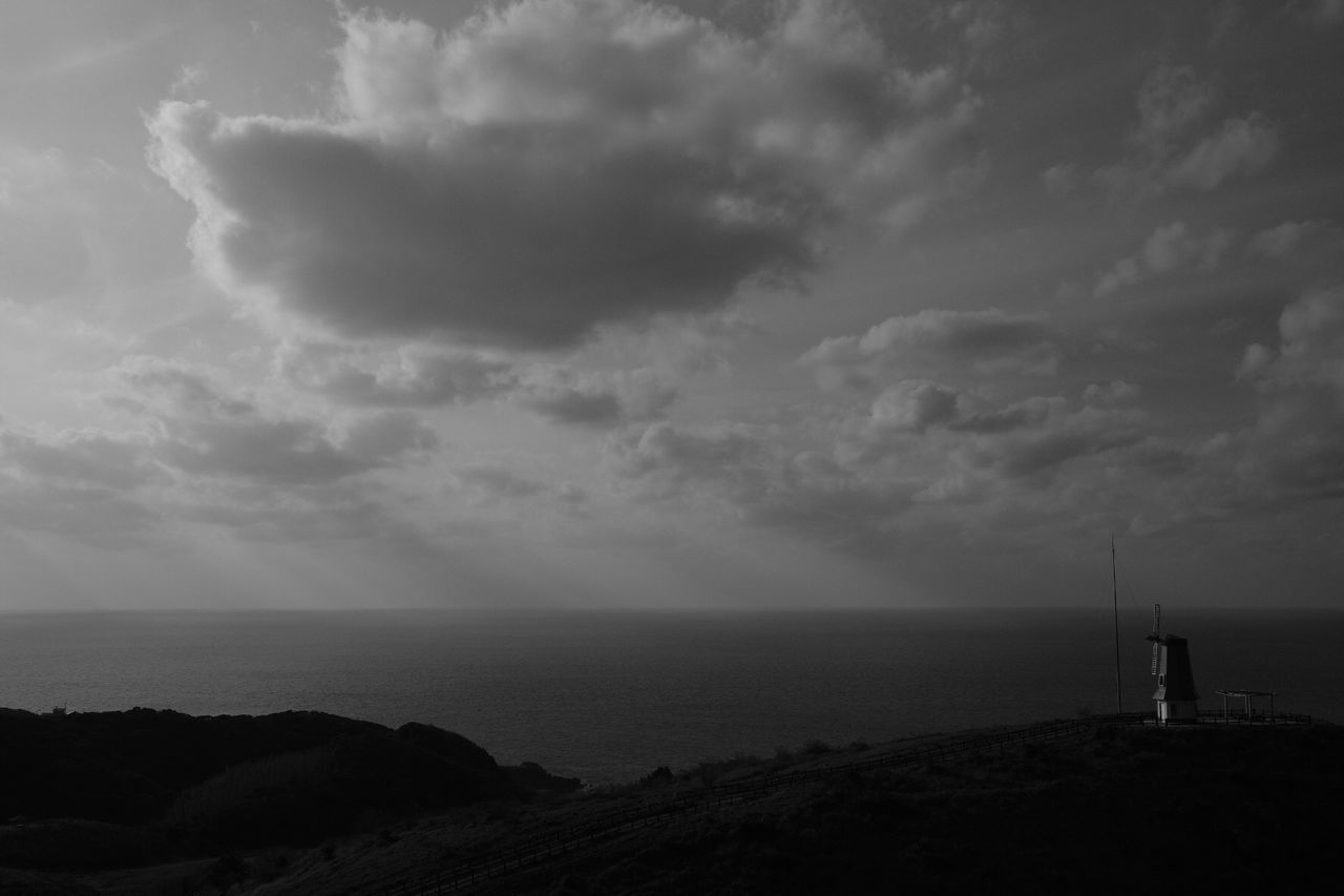 sea, sky, cloud - sky, water, scenics - nature, horizon, beauty in nature, horizon over water, tranquility, tranquil scene, land, nature, beach, no people, non-urban scene, day, outdoors, rock