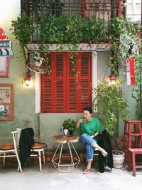 Young woman sitting on chair