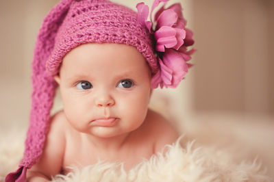 Close-up portrait of cute girl with flowers