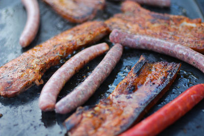 Close-up of meat on barbecue grill