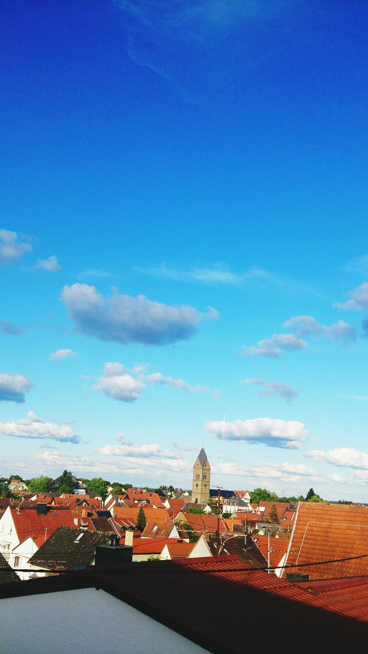 architecture, building exterior, built structure, roof, blue, house, sky, residential structure, town, residential building, residential district, townscape, day, cloud, outdoors, high angle view, cloud - sky, city, no people, copy space