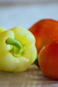 Close-up of orange slices on cutting board