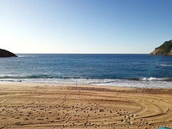 Scenic view of sea against clear sky