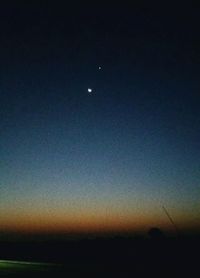 Scenic view of landscape against sky at night