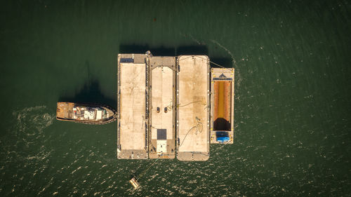 High angle view of illuminated ship in lake