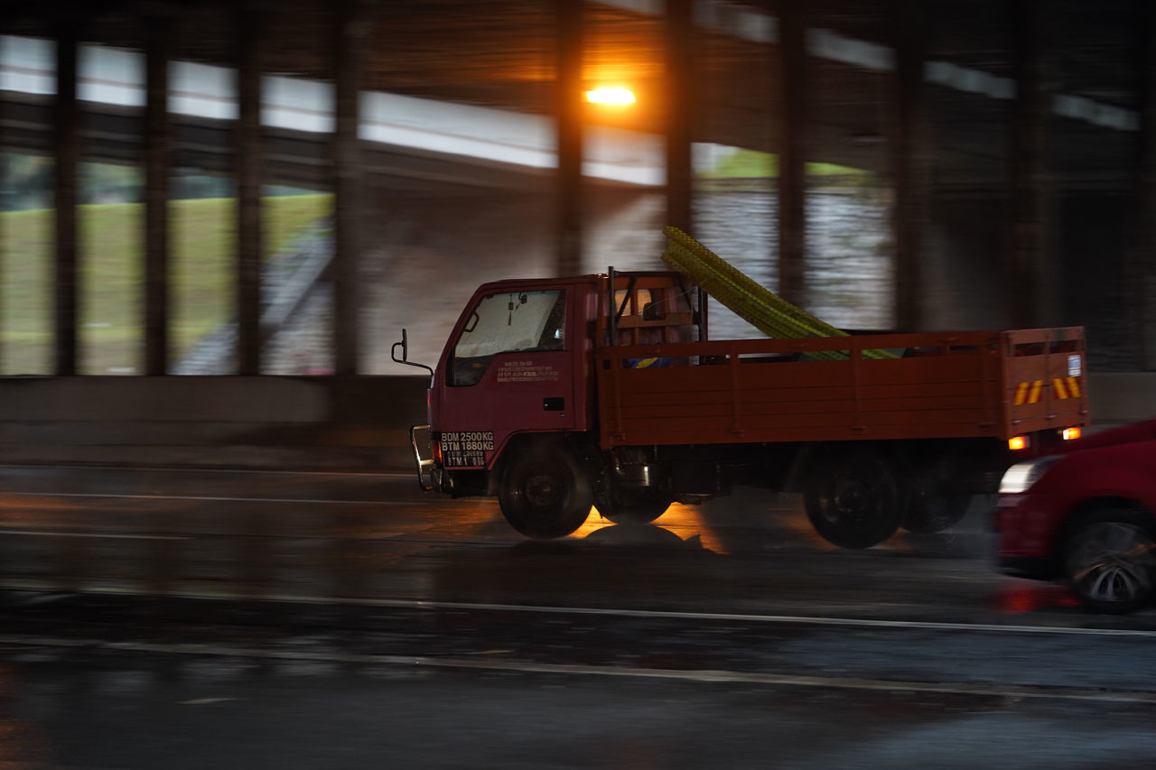 BLURRED MOTION OF CAR ON STREET