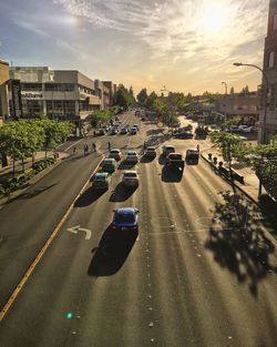 View of city street at sunset