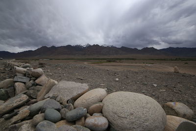 Rocks on land against sky