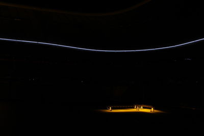 View of illuminated tunnel at night