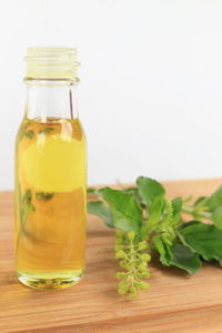 Close-up of drink in glass jar on table