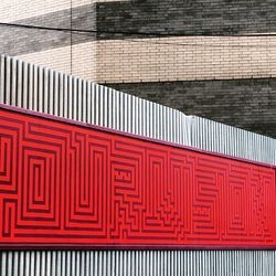 Red maze pattern on wall