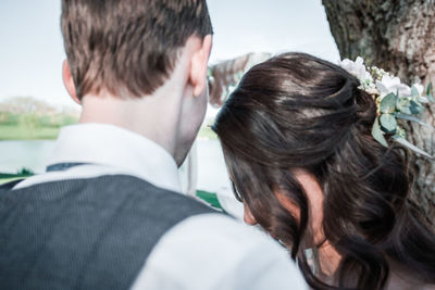 Rear view of couple kissing