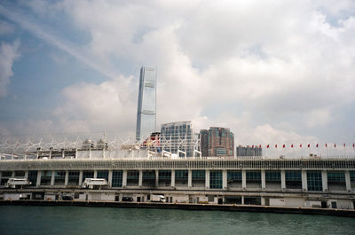 View of buildings against cloudy sky