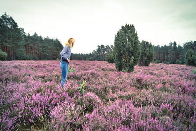 Full length of woman standing on field